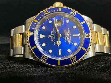 Rolex perpetual submariner 18kt